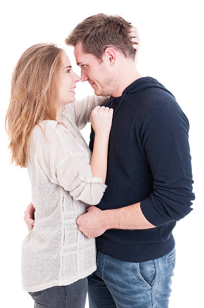 istock Pretty couple looking at each other and smiling 614872006