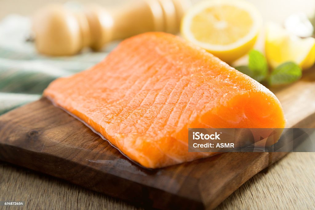 Salmon fish steck on the cutting board Salmon - Animal Stock Photo