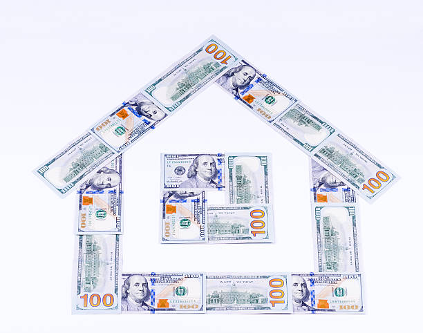 istock small house of one hundred dollar bills 614873168