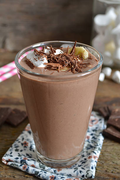 istock chocolate smoothie with oats and marshmallow on a wooden backgro 614874398