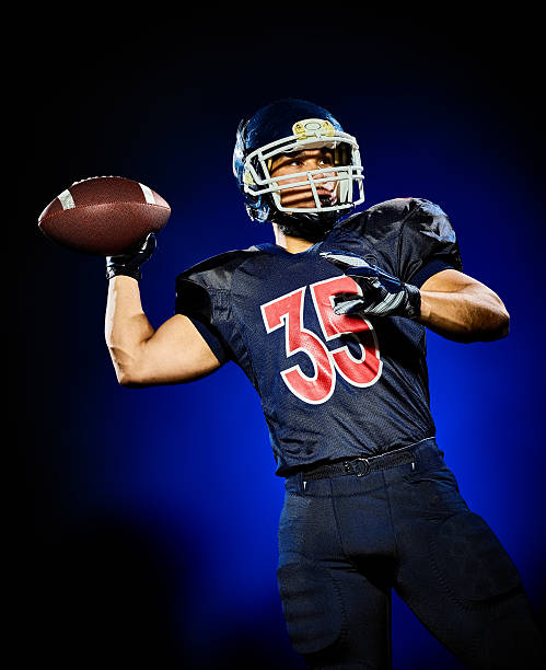 istock american football player man isolated 614874876