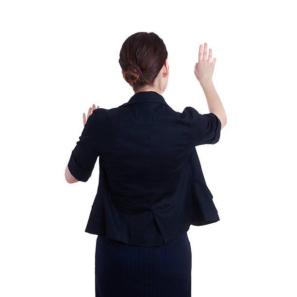 istock Businesswoman standing over white isolated background 614875228