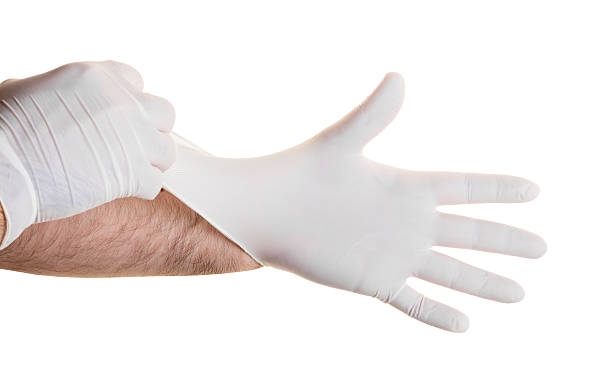 istock Hands in medical gloves 614877476