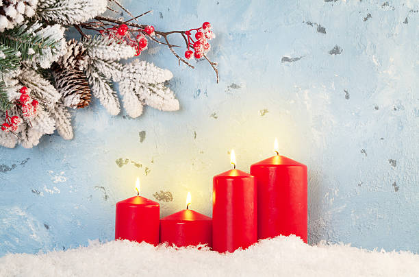 istock Christmas background with candles and fir tree 614879460