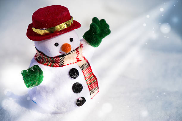 istock Snow man stand among pile of snow. 614950794
