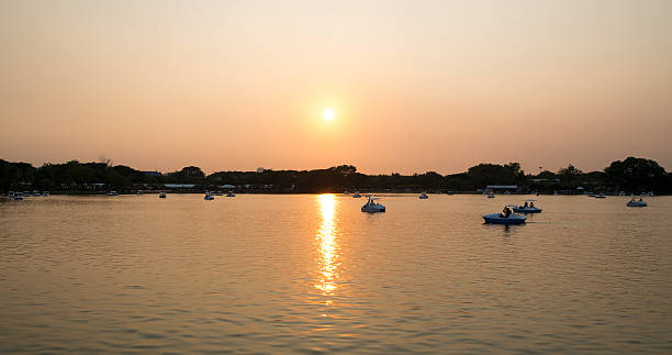 istock relax in pedal boat with sunset and twilight sky 614952268