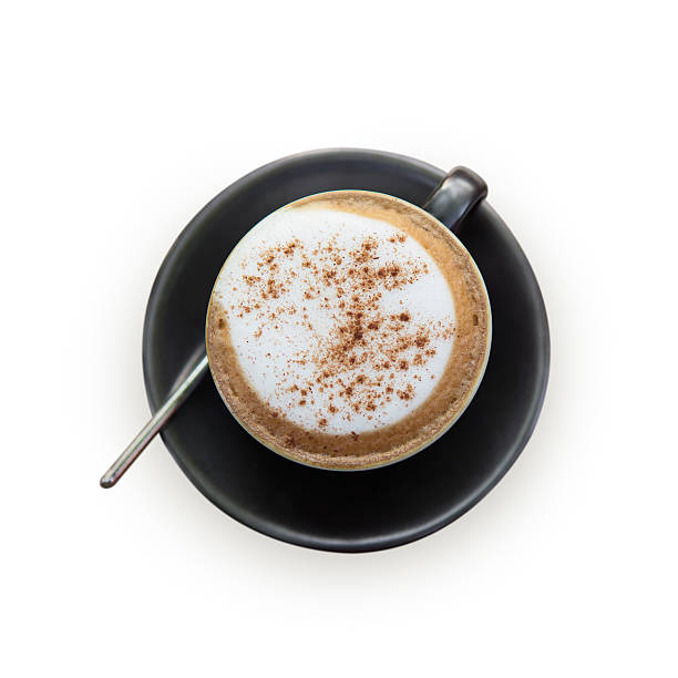 istock Hot cappuccino coffee cup on grass table with stone background 614952608