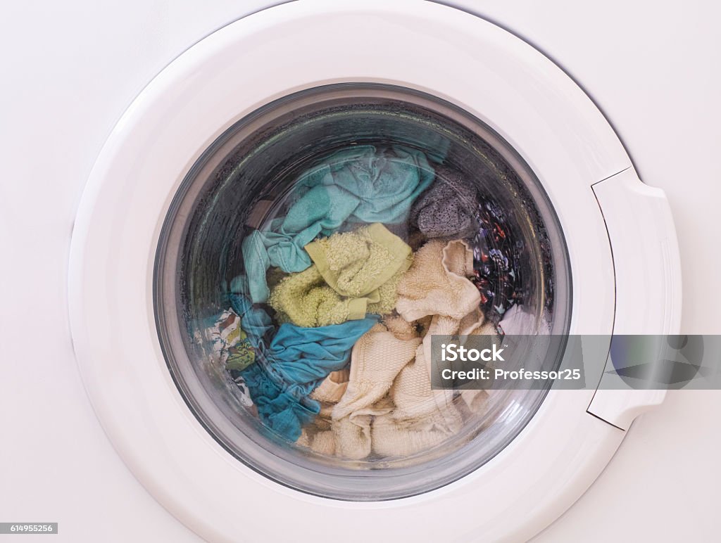 Full loaded washing machine Full loaded washing machine. Close up. Washing Machine Stock Photo