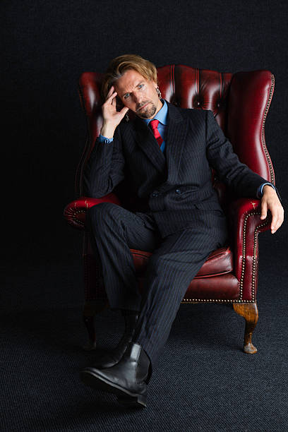 istock Very Modern Executive Wearing A Pinstripe Suit 614955832