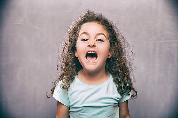 istock Adorable girl screaming 614955868