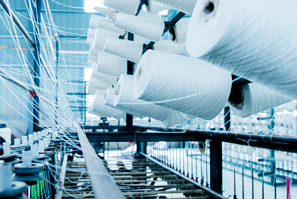 Cotton mill Factory on manufacture of threads textile industry stock pictures, royalty-free photos & images