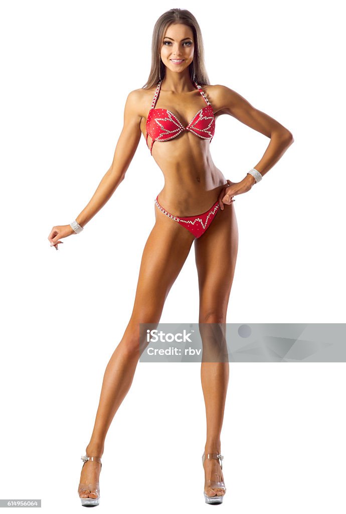 Young girl in fitness bikini Young girl in fitness bikini isolated Women Stock Photo