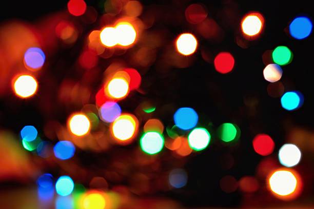 istock Abstract christmas background, xmas texture from color lights. 614957998