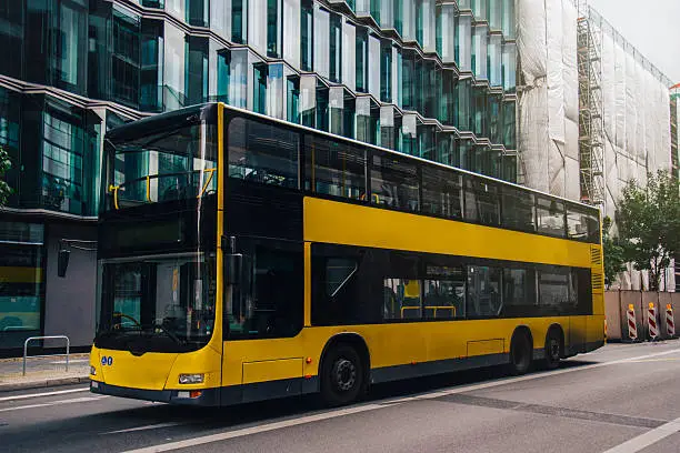A yellow Berlin bus