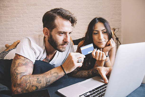 istock Young couple at home - Online Shopping 614959210