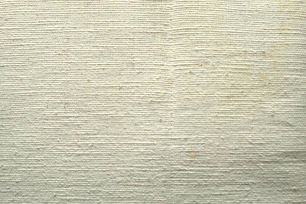 istock Beige coarse cotton cloth burlap hessian texture 614959856