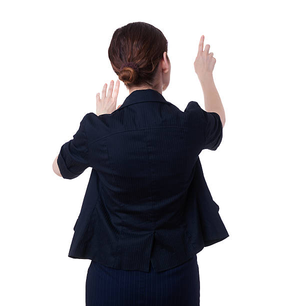istock Businesswoman standing over white isolated background 614960234