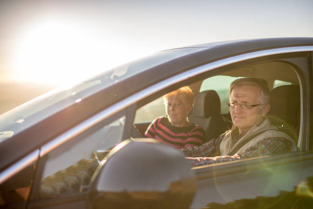 istock Senior couple enjoying a drive 614960398