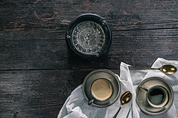 istock Still life with coffee cups and ashtray 614962378