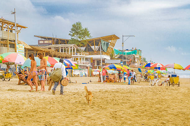 People at Montanita Beach Ecuador Montanita, Ecuador - October 23, 2015: Crowded beach in Montanita, the most famous watering place in Ecuador montanita ecuador stock pictures, royalty-free photos & images