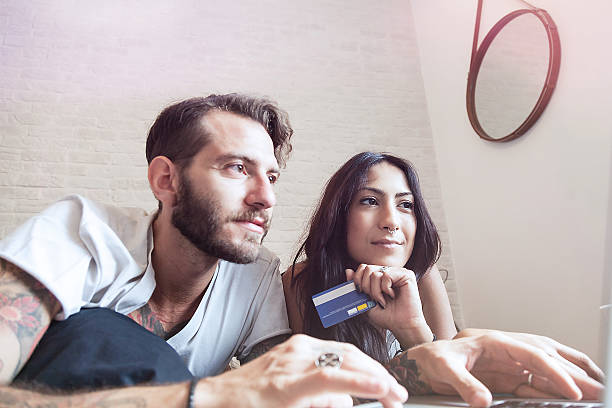 istock Young couple at home - Online Shopping 614967536