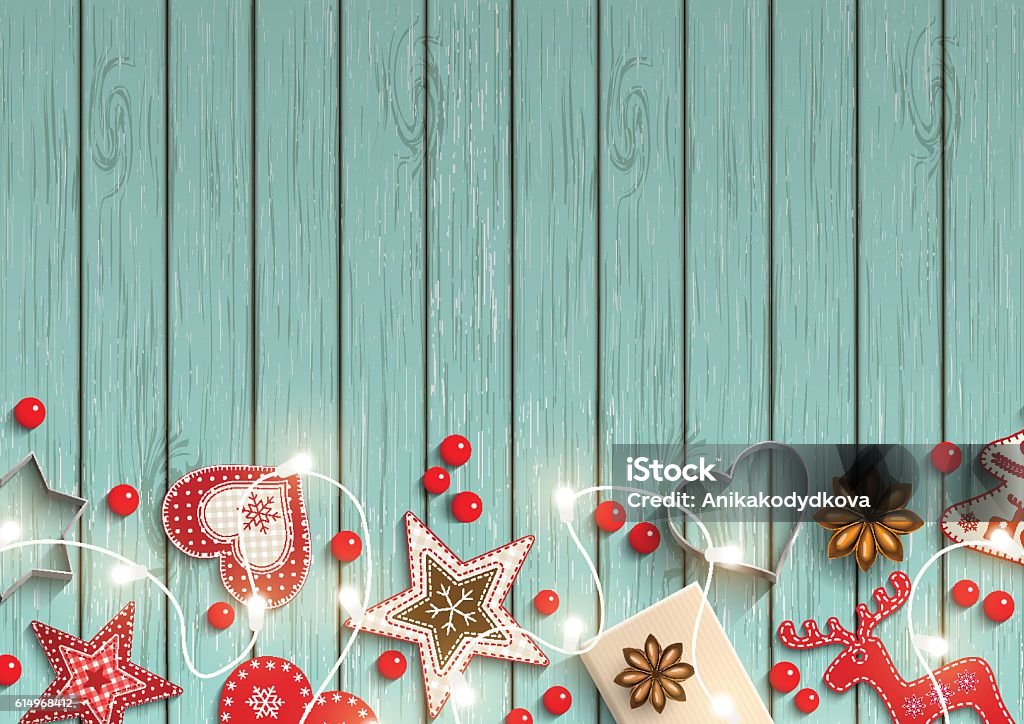 Fondo navideño, pequeñas decoraciones de estilo escandinavo tumbadas sobre madera azul - arte vectorial de Navidad libre de derechos