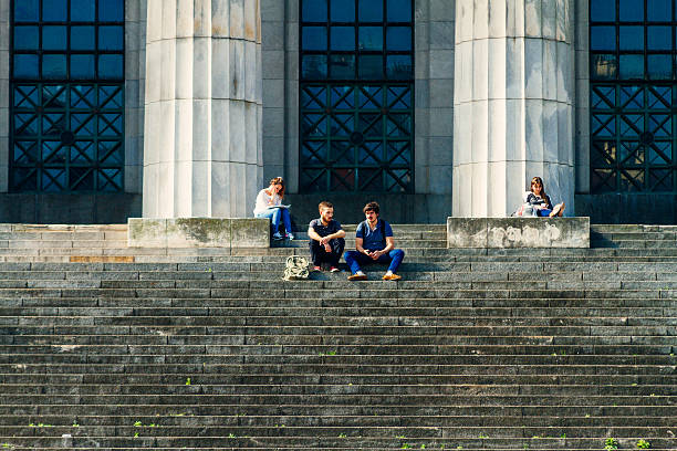 Stockholm, Sweden - May 19, 2012: Pedestrians queueing on street in Kungstradgarden,  central Stockholm.