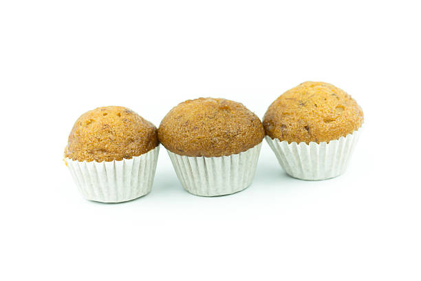 istock Banana muffin cupcakes isolated on white background 614975006