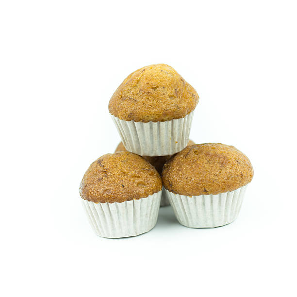 istock Banana muffin cupcakes isolated on white background 614975100
