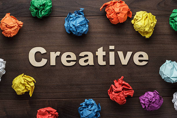istock word creative and crumpled colorful paper 614977898