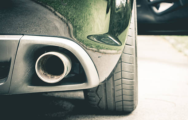 istock car muffler on the right hand side 614978202