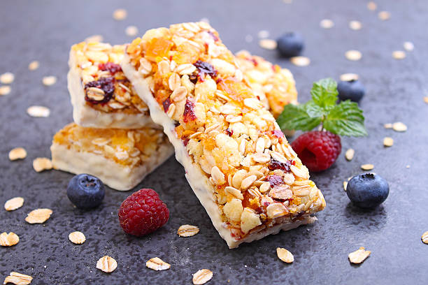 istock healthy snack, muesli bars with raisins 614978326