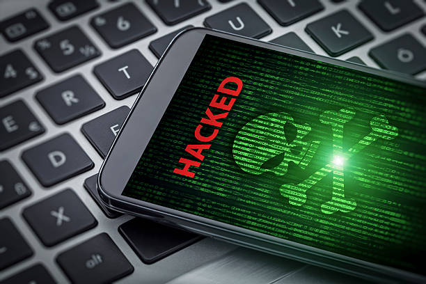 hacked message and skull of death on smartphone screen