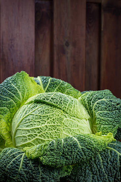 istock Green fresh whole Savoy cabbage close up 614979518