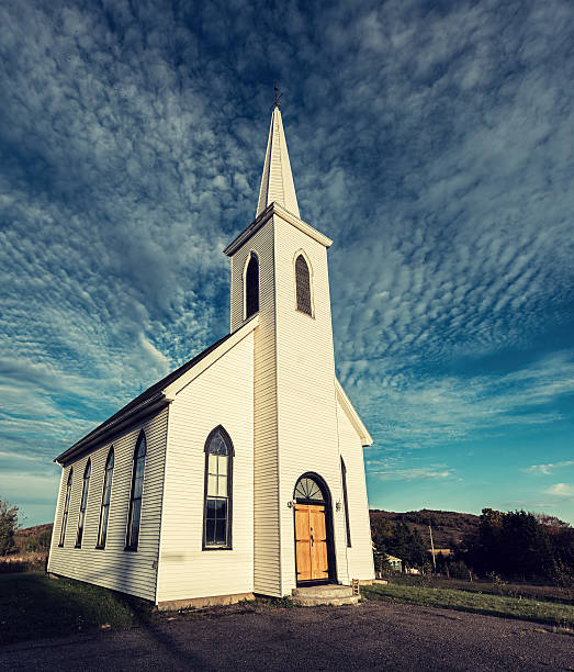istock Church in Autumn Sunlight 614979566