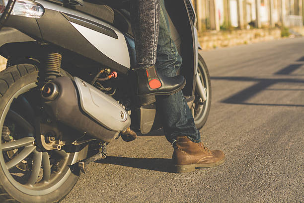 istock Young couple riding motorcycle 614980234