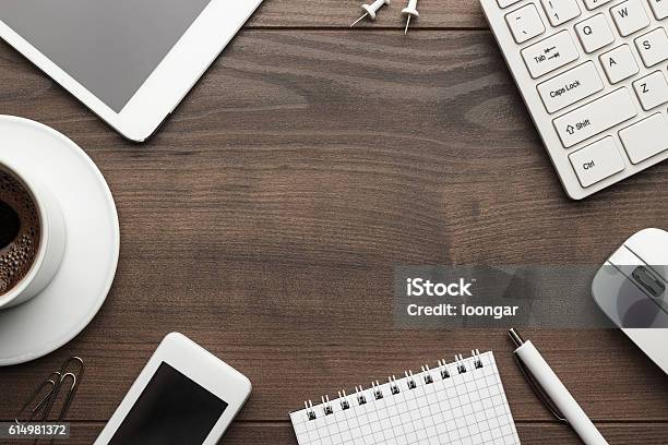 Overhead Of Office Table With Copy Space Stock Photo - Download Image Now - Wood - Material, Laptop, Desk