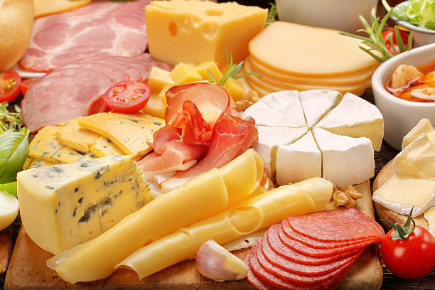 istock Board of various types of cheese and appetizers set 614982684