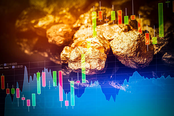 Gold nuggets on black background. stock photo