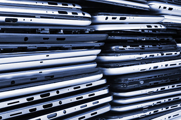 istock Stacks of disassembled tablets and smartphones 614983670