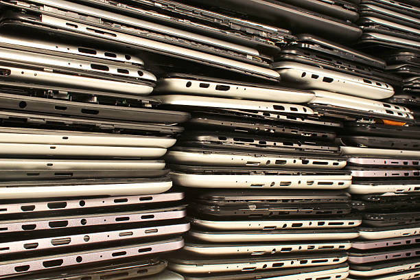 istock Stacks of disassembled tablets and smartphones 614983742