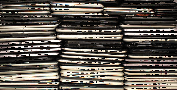 istock Stacks of disassembled tablets and smartphones 614983802