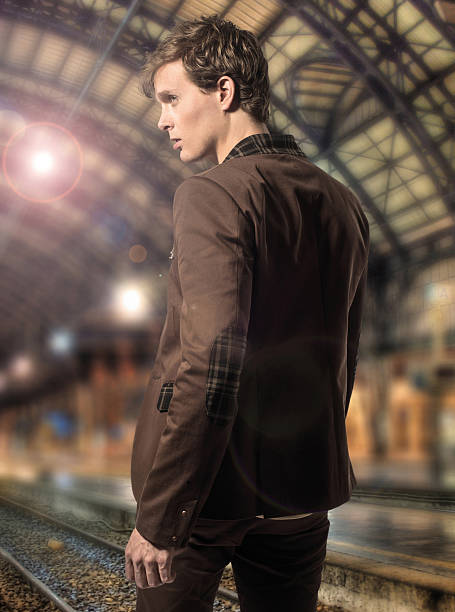 istock Handsome man in the city at night 614983880