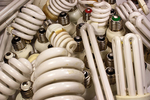 istock Old burnt fluorescent energy saving lamps. 614983890