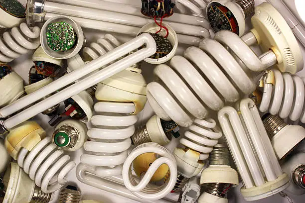 Photo of Old burnt fluorescent energy saving lamps.