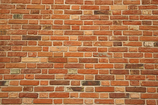 istock Background of red brick wall 614985434