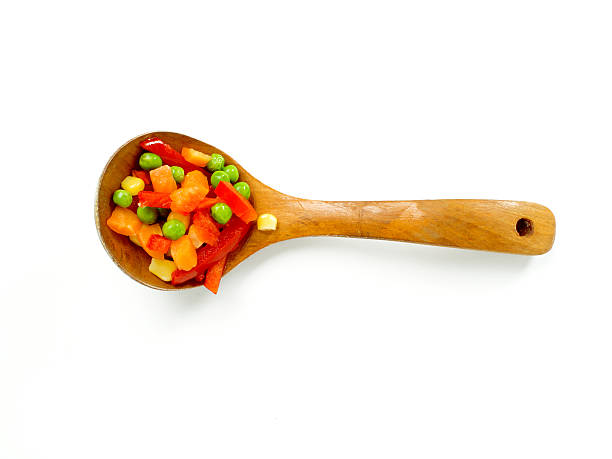 Wooden spoon with vegetable