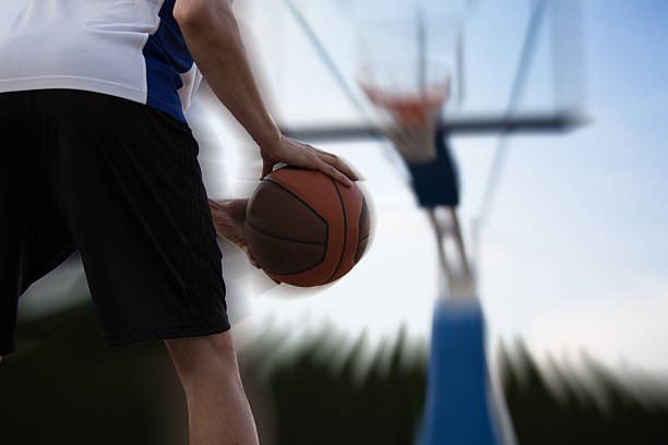 istock Basketball player training on the court. concept about basketbal 614988648