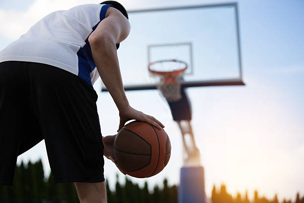 istock Basketball player training on the court. concept about basketbal 614988734