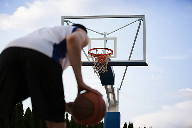 istock Basketball player training on the court. concept about basketbal 614988856